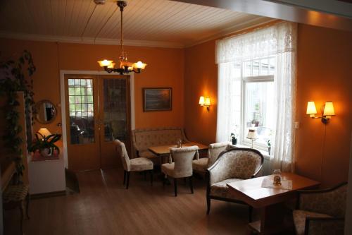 sala de TV, Midtnes Hotel in Balestrand sala de TV, Midtnes Hotel in Balestrand