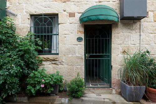 This photo about Heritage Listed Sandstone Cottage shared on HyHotel.com