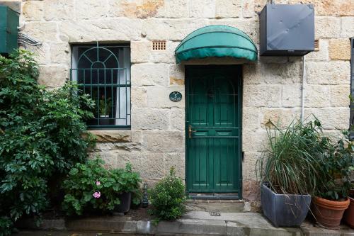 This photo about Heritage Listed Sandstone Cottage shared on HyHotel.com