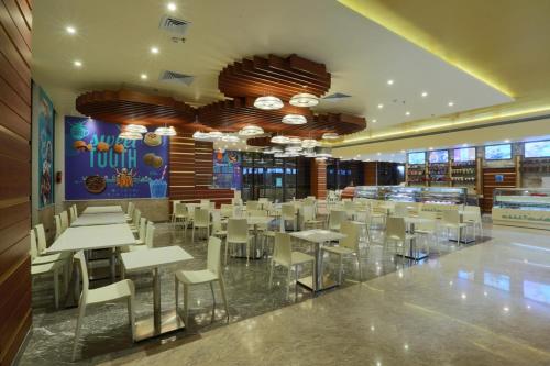 ห้องอาหาร, Centrum Hotel by Brijwasi in มธุระ ห้องอาหาร, Centrum Hotel by Brijwasi in มธุระ