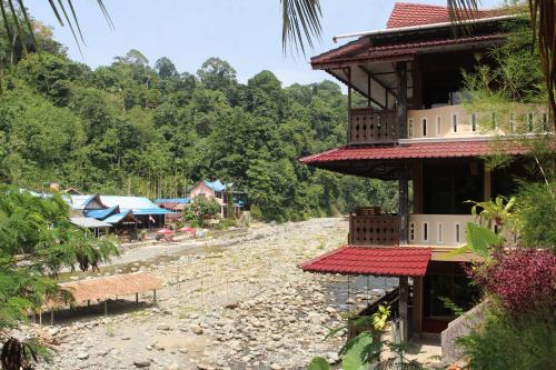 Erkély/terasz, Fidodido Guesthouse & Jungle Trekking in Bukit Lawang Erkély/terasz, Fidodido Guesthouse & Jungle Trekking in Bukit Lawang