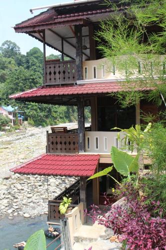 Erkély/terasz, Fidodido Guesthouse & Jungle Trekking in Bukit Lawang Erkély/terasz, Fidodido Guesthouse & Jungle Trekking in Bukit Lawang