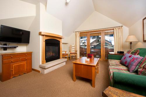 Közös társalgó / TV, Zephyr Mountain Lodge in Winter Park (Colorado) Közös társalgó / TV, Zephyr Mountain Lodge in Winter Park (Colorado)
