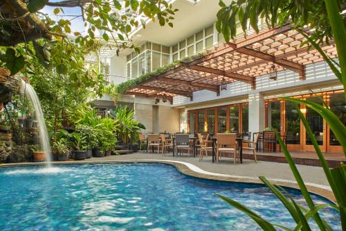 Swimming pool, Jambuluwuk Malioboro Hotel Yogyakarta in Yogyakarta Swimming pool, Jambuluwuk Malioboro Hotel Yogyakarta in Yogyakarta