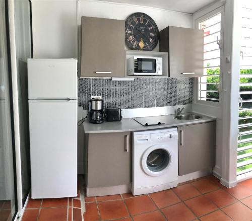 This photo about Ti.Maanga Vue Mer Pieds Dans L'Eau shared on HyHotel.com