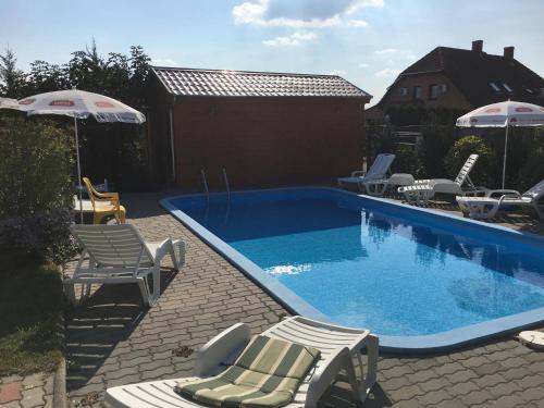 This photo about Sarga-Kek Haz shared on HyHotel.com