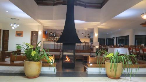 Vestíbulo, Plumeria Hotel in Antsirabe Vestíbulo, Plumeria Hotel in Antsirabe
