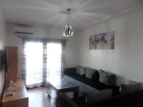 Bel appartement avec piscine in 사이디아 Bel appartement avec piscine in 사이디아
