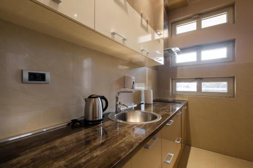 مطبخ, Apart K Apartments & Rooms in Novi Beograd مطبخ, Apart K Apartments & Rooms in Novi Beograd