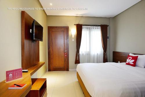 This photo about ZEN Rooms Adilla Syariah Ambarukmo shared on HyHotel.com