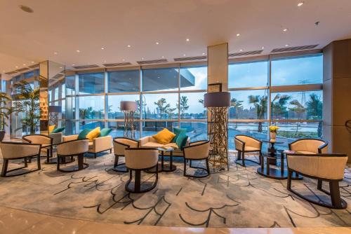 Shared lounge/TV area, Enso Hotel in Deltamas Shared lounge/TV area, Enso Hotel in Deltamas