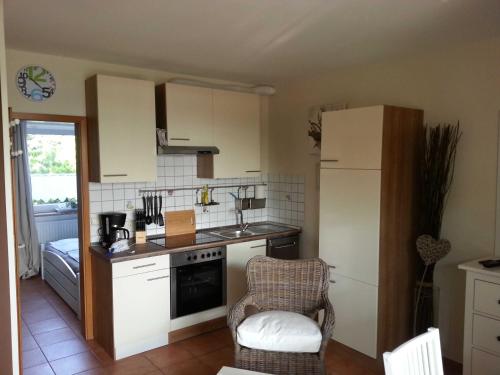 Kitchen, Strandhaus Buchtmitte in Scharbeutz Kitchen, Strandhaus Buchtmitte in Scharbeutz