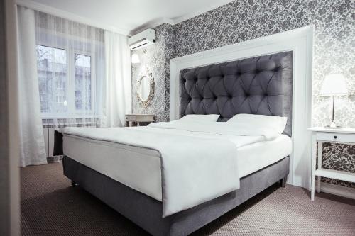Łóżko, Skif HOTEL & SPA in Petropavlovsk Łóżko, Skif HOTEL & SPA in Petropavlovsk