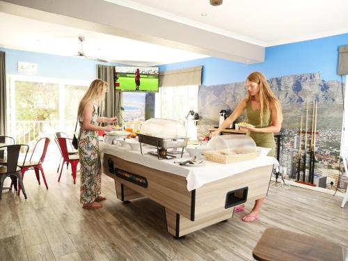 Restaurant, Ashanti Lodge Gardens in Le Cap Restaurant, Ashanti Lodge Gardens in Le Cap