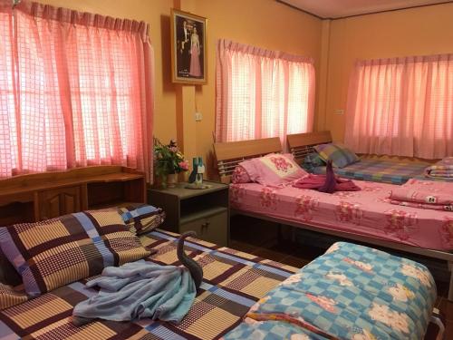 This photo about Ban Pak Glang Toong Pua Nan shared on HyHotel.com