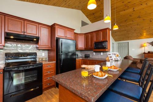 kuhinja, 302 - Le Chalet du Breton - Les Immeubles Charlevoix in Baie-Saint-Paul (QC) kuhinja, 302 - Le Chalet du Breton - Les Immeubles Charlevoix in Baie-Saint-Paul (QC)