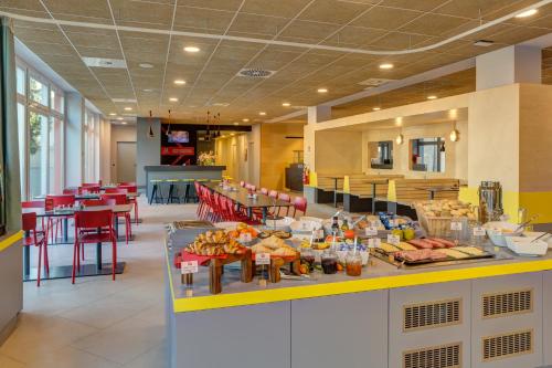 Food and beverages, MEININGER Milano Garibaldi in Stazione Garibaldi Food and beverages, MEININGER Milano Garibaldi in Stazione Garibaldi