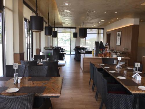 Restaurant, Beautiful Apartments at Tarudhan Valley Golf Resort, Manesar in Manesar Restaurant, Beautiful Apartments at Tarudhan Valley Golf Resort, Manesar in Manesar