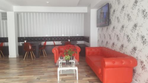 Bar/ Salón, Deluxe Hostels & Suites Merida in Merida Bar/ Salón, Deluxe Hostels & Suites Merida in Merida