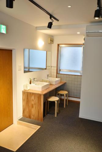 This photo about Tomarigi Hostel Cafe Bar shared on HyHotel.com