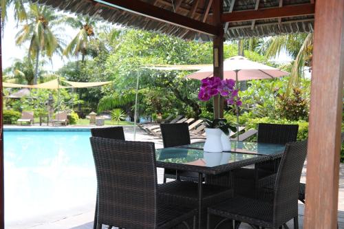 普里邦加海滩别墅酒店 (Puri Bunga Beach Cottages Hotel) in 龙目岛 普里邦加海滩别墅酒店 (Puri Bunga Beach Cottages Hotel) in 龙目岛
