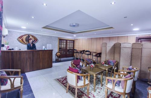 gedeelde lounge/tv-ruimte, Residence Hoteliere Le Jomonia near Luchthaven Libreville gedeelde lounge/tv-ruimte, Residence Hoteliere Le Jomonia near Luchthaven Libreville