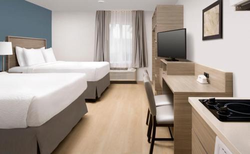 在meiguo.com看到的WoodSpring Suites Seattle Redmond的介绍图片