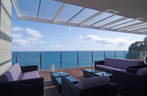 Балкон/тераса, Pestana Carlton Madeira Ocean Resort Hotel in остров Мадейра Балкон/тераса, Pestana Carlton Madeira Ocean Resort Hotel in остров Мадейра