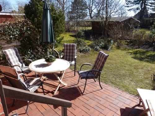 Garden, Ferienwohnung *Reetblick* in Nebel Garden, Ferienwohnung *Reetblick* in Nebel