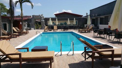 Πισίνα, Hotel des Jardins in Abidjan Πισίνα, Hotel des Jardins in Abidjan