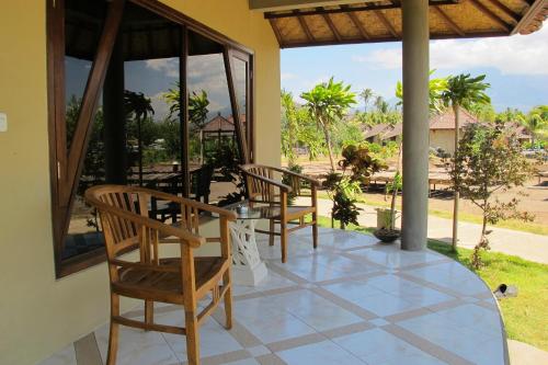 Balcony/terrace, Hotel Uyah Amed Spa & Resort in Amed Balcony/terrace, Hotel Uyah Amed Spa & Resort in Amed