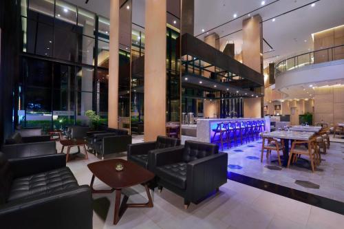 Shared lounge/TV area, Harper Cikarang by ASTON in Deltamas Shared lounge/TV area, Harper Cikarang by ASTON in Deltamas