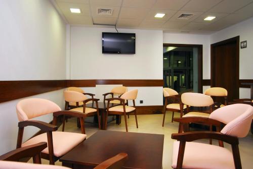 Shared lounge/TV area, Hotel Domus Plaza Zocodover in Toledo City Center Shared lounge/TV area, Hotel Domus Plaza Zocodover in Toledo City Center