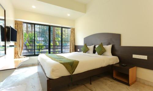 This photo about Treebo Trip Hill View Ex shared on HyHotel.com