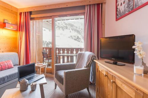 sala de TV, Residence Pierre & Vacances Premium les Crets in Meribel sala de TV, Residence Pierre & Vacances Premium les Crets in Meribel
