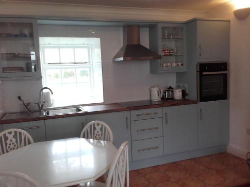Kitchen, The Stables Holiday Cottage No 9 by Trident Holiday Homes in Wexford Kitchen, The Stables Holiday Cottage No 9 by Trident Holiday Homes in Wexford