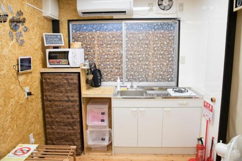 Kitchen, Half Glamping Hoshioto in Nakijin Kitchen, Half Glamping Hoshioto in Nakijin