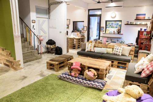 Shared lounge/TV area, Kuang Kuang Hostel in Longjing Township Shared lounge/TV area, Kuang Kuang Hostel in Longjing Township