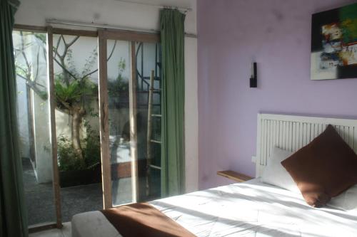 This photo about Gusti Homestay Kerobokan shared on HyHotel.com