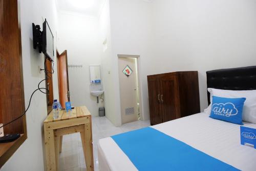 This photo about Airy Eco Syariah Wonokromo Karangrejo Sawah Surabaya shared on HyHotel.com