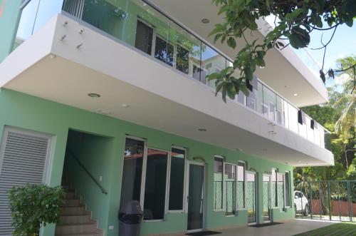 Entrance, Room2Board Hostel and Surf School in Jaco Entrance, Room2Board Hostel and Surf School in Jaco