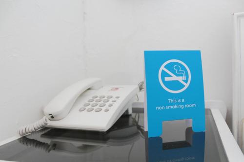 This photo about Airy Alun Alun Dewi Sartika 18 Bandung shared on HyHotel.com