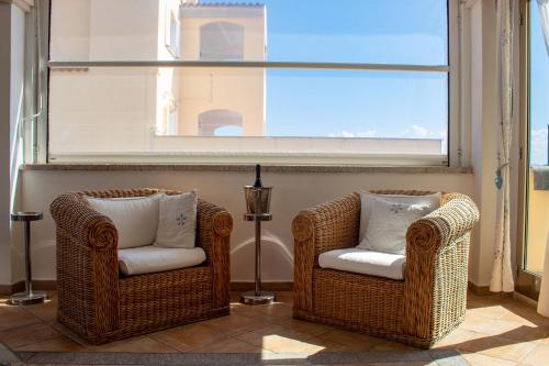 Shared lounge/TV area, Olbia City Hotel in Olbia Shared lounge/TV area, Olbia City Hotel in Olbia