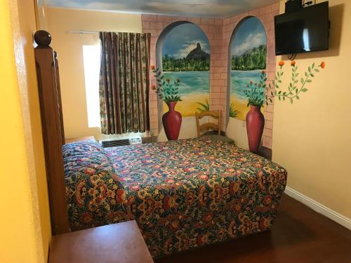 在meiguo.com看到的Deluxe Inn Motel的介绍图片