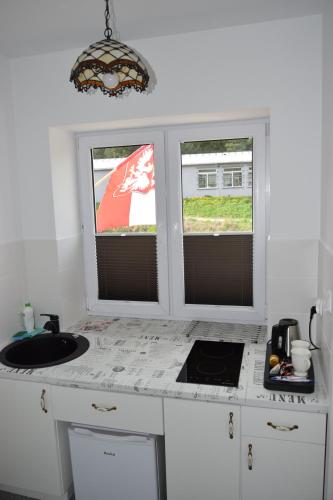 Létesítmények, Remiza w Starej Papierni in Lapino Létesítmények, Remiza w Starej Papierni in Lapino