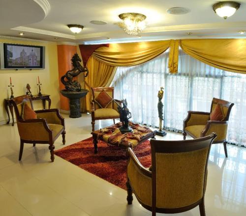 Shared lounge/TV area, Hotel Prado Internacional in Loja Shared lounge/TV area, Hotel Prado Internacional in Loja