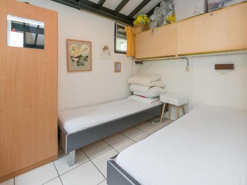 This photo about Lovely Bungalow in Giethmen amid the Lush Forest shared on HyHotel.com