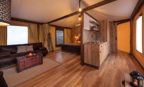 This photo about Glamping tents Mediteran kamp Navis shared on HyHotel.com