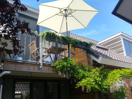 شرفة/ تراس, Appartementen Het Oude Atelier in بيرغن شرفة/ تراس, Appartementen Het Oude Atelier in بيرغن