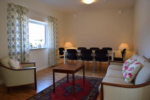 Shared lounge/TV area, Lilla Rygardens B&B in Ljungbyhed Shared lounge/TV area, Lilla Rygardens B&B in Ljungbyhed